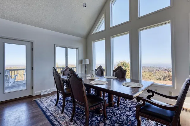 a open kitchen with white cabinets and sink