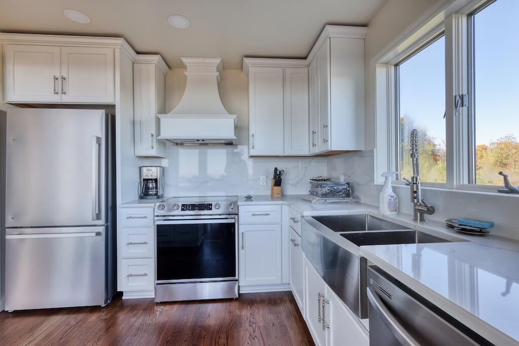 3384 Fairview Church Road Southwest Floyd, VA 24091 - Photo 15 of 62 a kitchen with stainless steel appliances granite countertop a sink stove and refrigerator