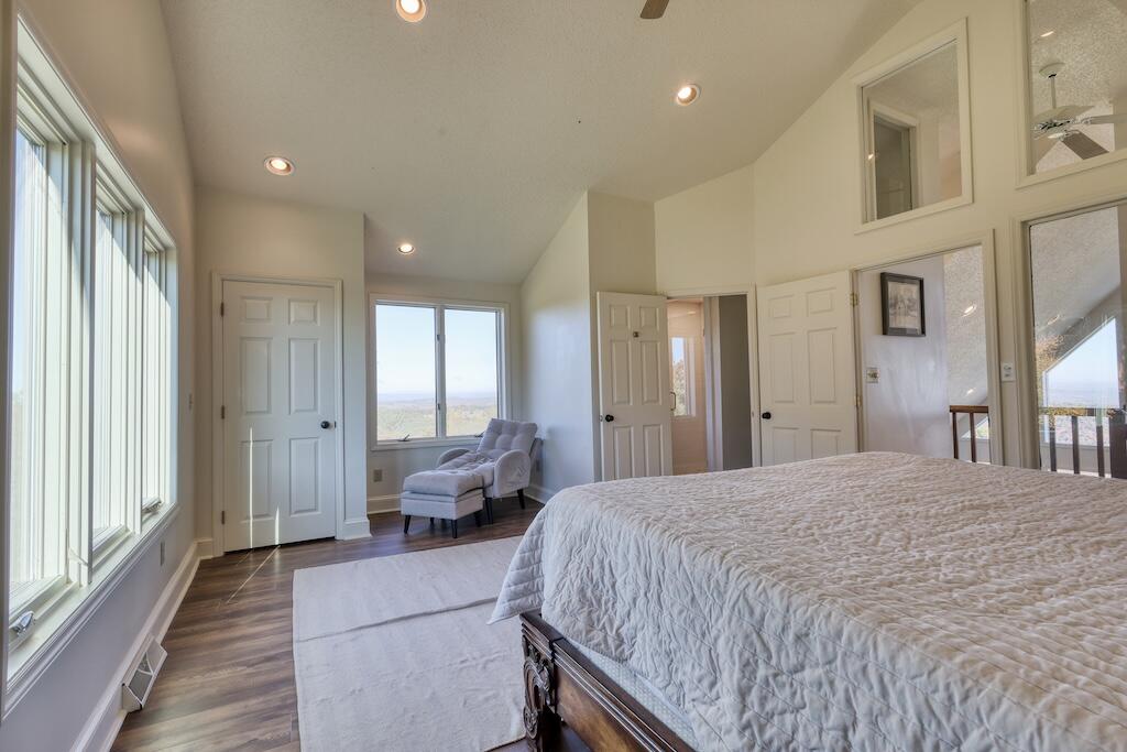 3384 Fairview Church Road Southwest Floyd, VA 24091 - Photo 25 of 62 a spacious bedroom with a balcony a bed and a large window