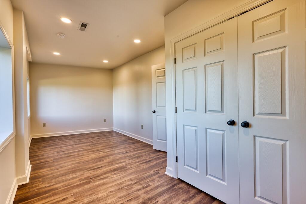 3384 Fairview Church Road Southwest Floyd, VA 24091 - Photo 33 of 62 a view of a hallway with wooden floor