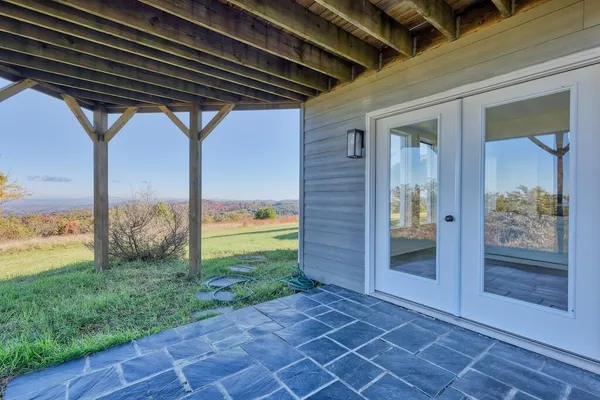 a view of a lake with a yard