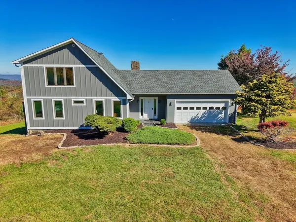 a view of a balcony with wooden floor