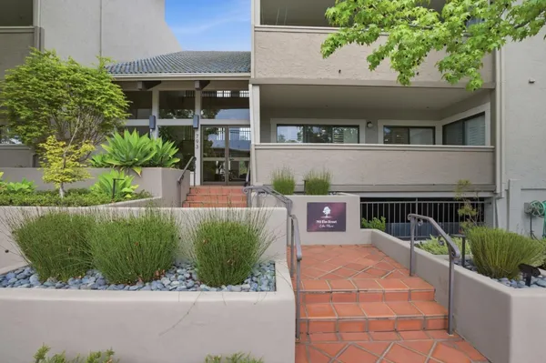 a view of house with outdoor space and sitting space