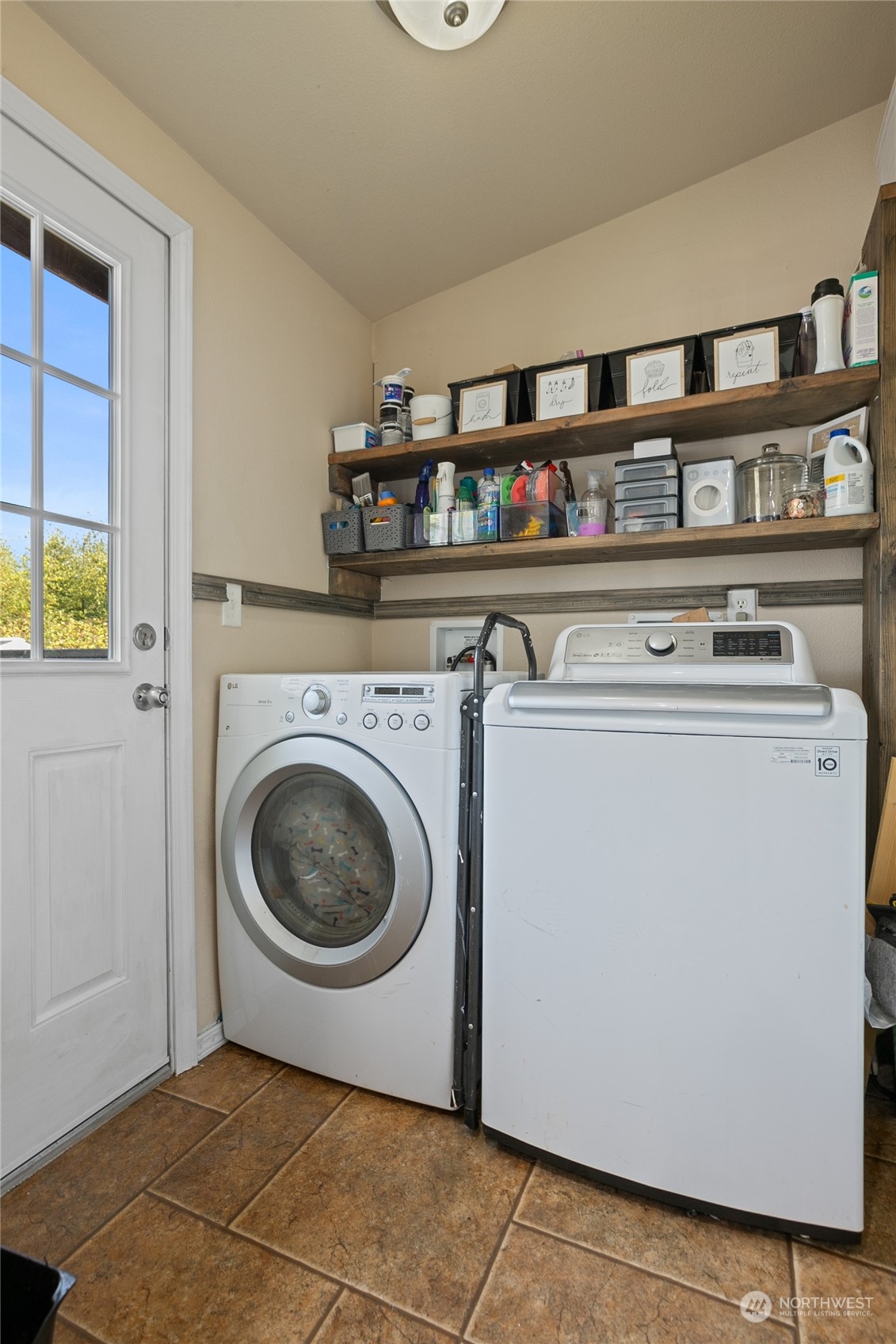 4599 Decatur Drive Ferndale, WA 98248 - Photo 14 of 18 a utility room with dryer and washer