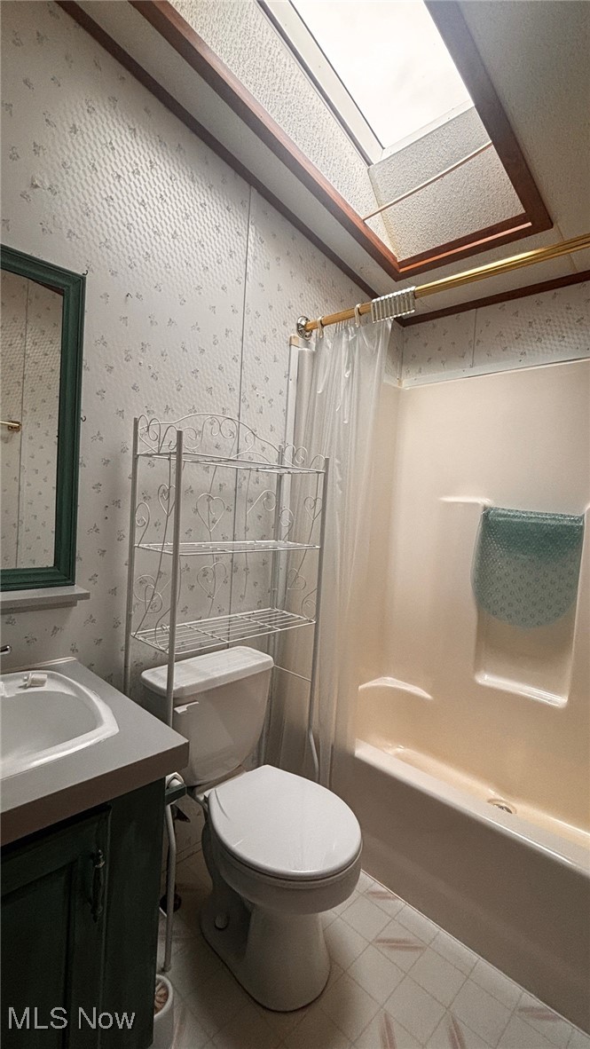 2090 Big Flint Road Salem, WV 26426 - Photo 11 of 22 Bathroom with shower / bath combo, vanity, and wallpapered walls
