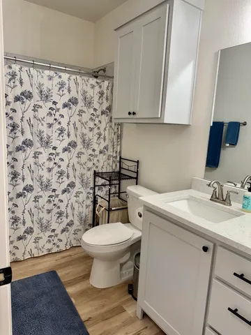 a bedroom with bed and window