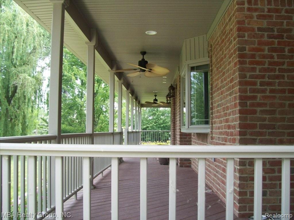 2000 Carleton Rockwood Road Carleton, MI 48117 - Photo 24 of 25 Wrap around porch
