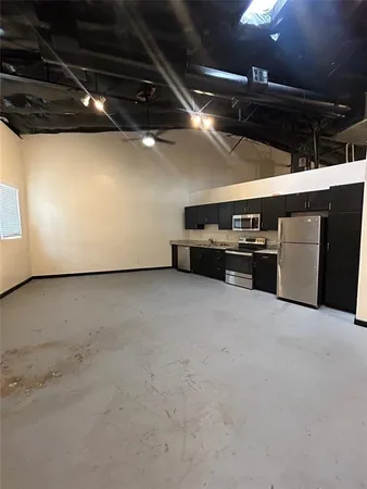 a view of a garage with furniture