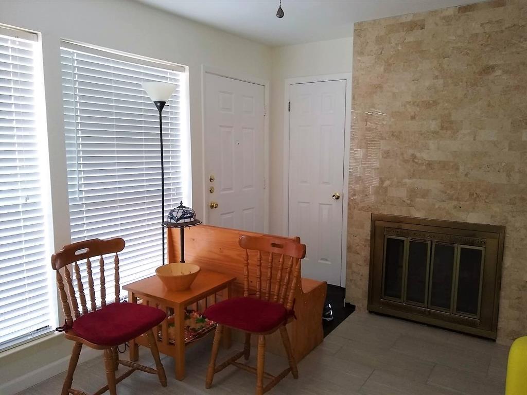 3115 Helms Street, Unit 308 Austin, TX 78705 - Photo 3 of 14 a view of a room with furniture and window