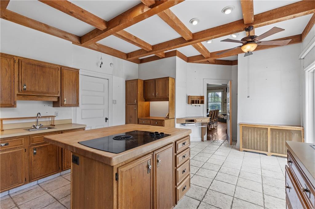859 Blackburn Road Sewickley, PA 15143 - Photo 11 of 28 a kitchen that has a sink and a stove in it
