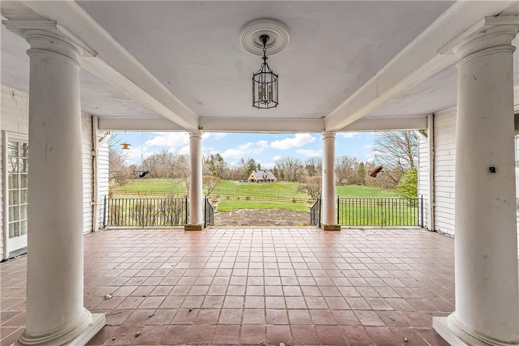 859 Blackburn Road Sewickley, PA 15143 - Photo 18 of 28 a view of a room with wooden floor and balcony