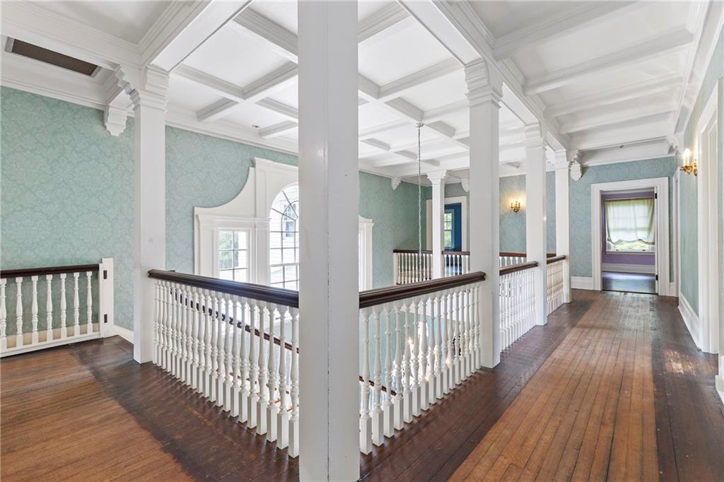 859 Blackburn Road Sewickley, PA 15143 - Photo 21 of 28 a view of a hallway view with wooden floor and staircase