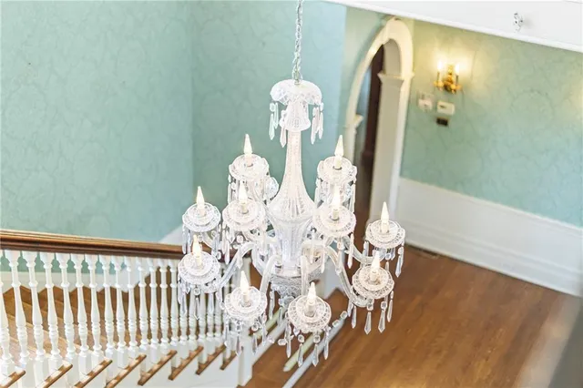 a bathroom with a sink mirror and a bathtub