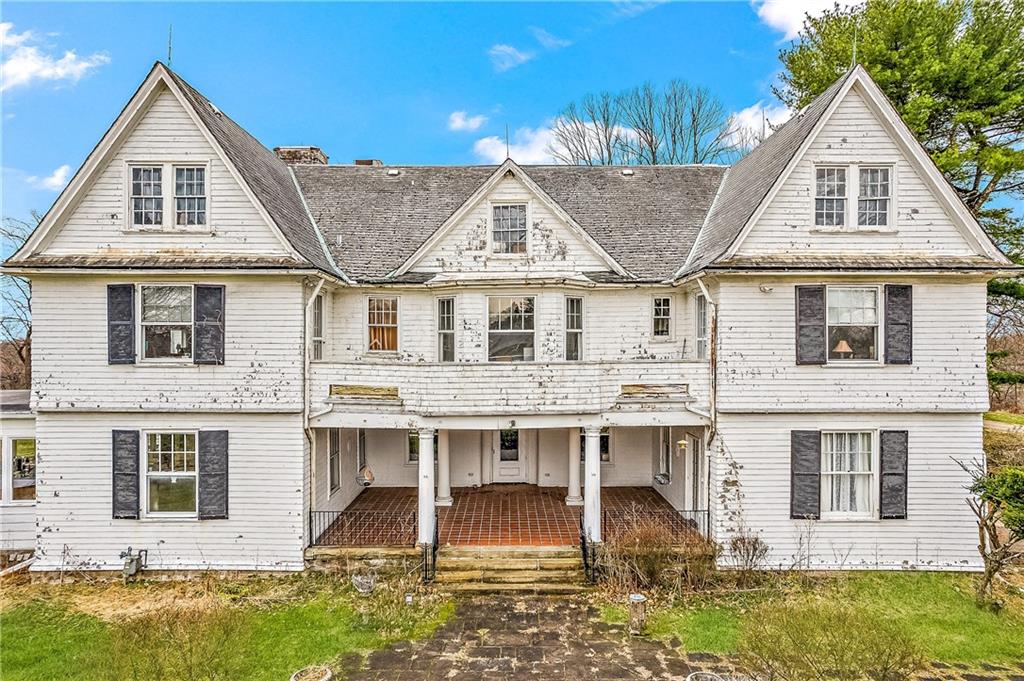 859 Blackburn Road Sewickley, PA 15143 - Photo 27 of 28 a aerial view of a house with swimming pool and porch