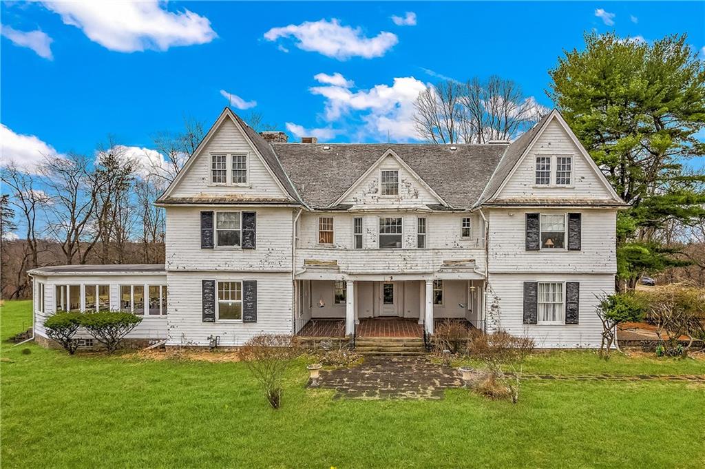 859 Blackburn Road Sewickley, PA 15143 - Photo 28 of 28 a view of a yard in front of a house with large windows