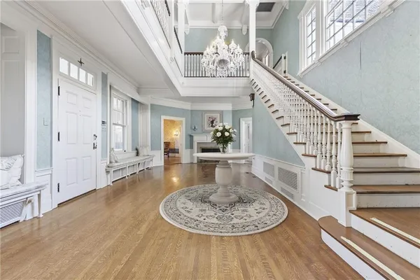 a view of a livingroom with wooden floor and a living room