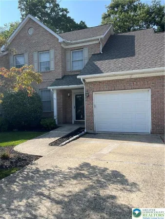 a front view of house with yard