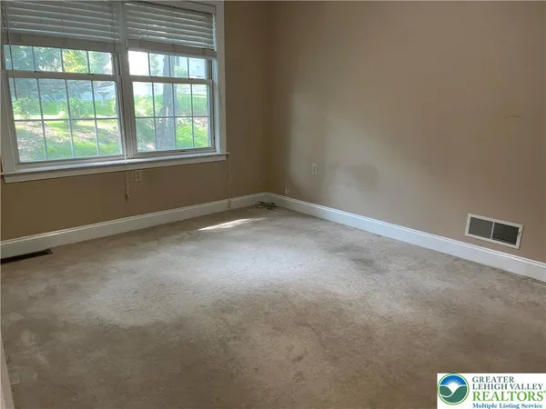 an empty room with a window