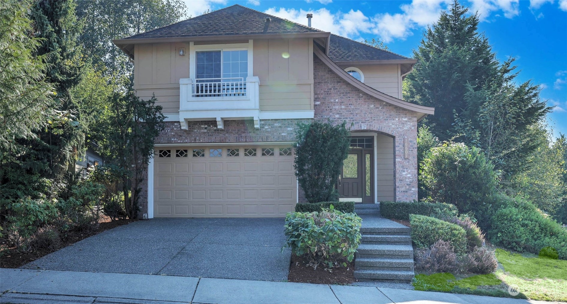 16601 Southeast 165th Way Renton, WA 98058 - Photo 31 of 33 a front view of house with trees in the background