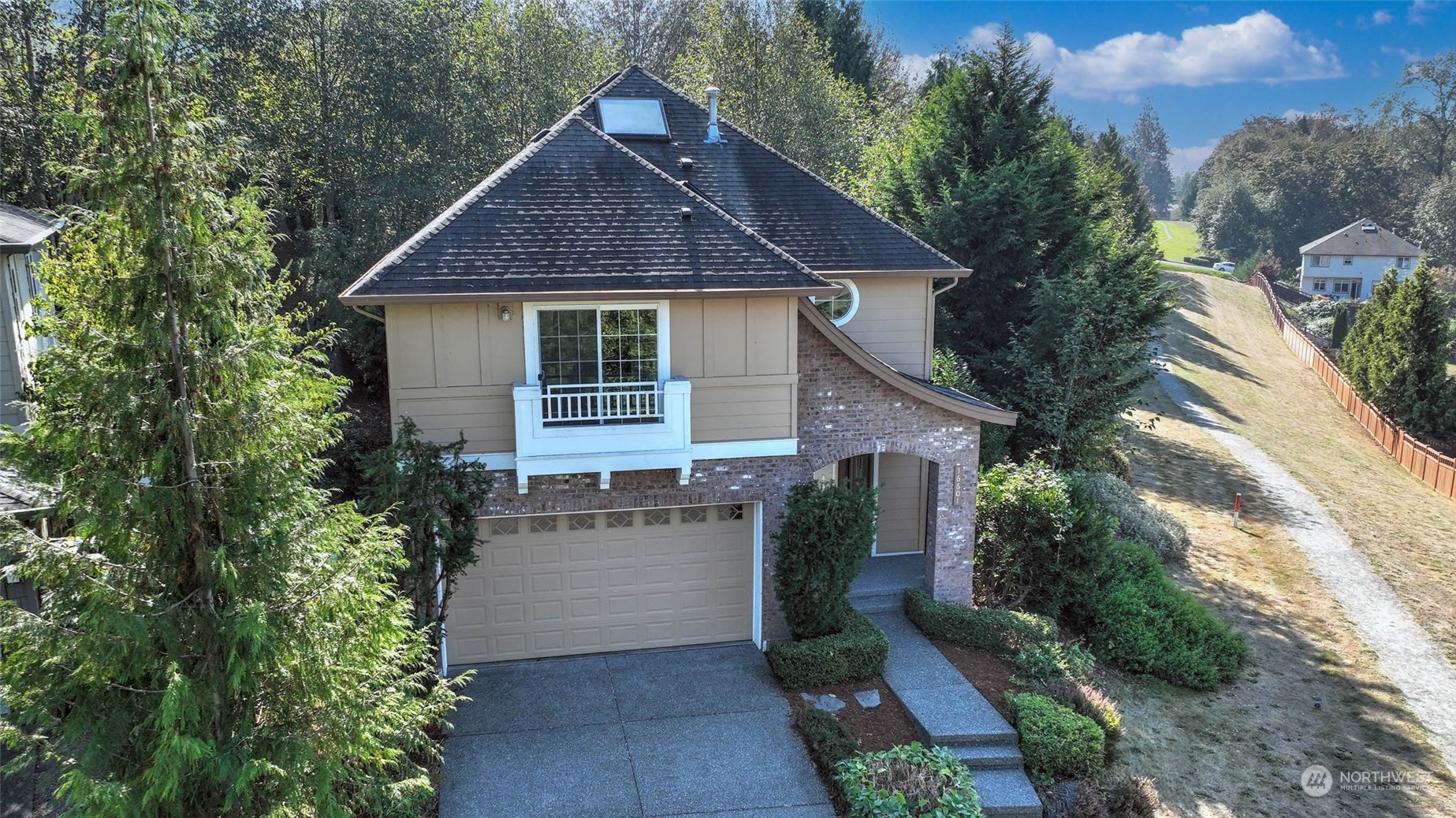 16601 Southeast 165th Way Renton, WA 98058 - Photo 32 of 33 a front view of a house with a garden