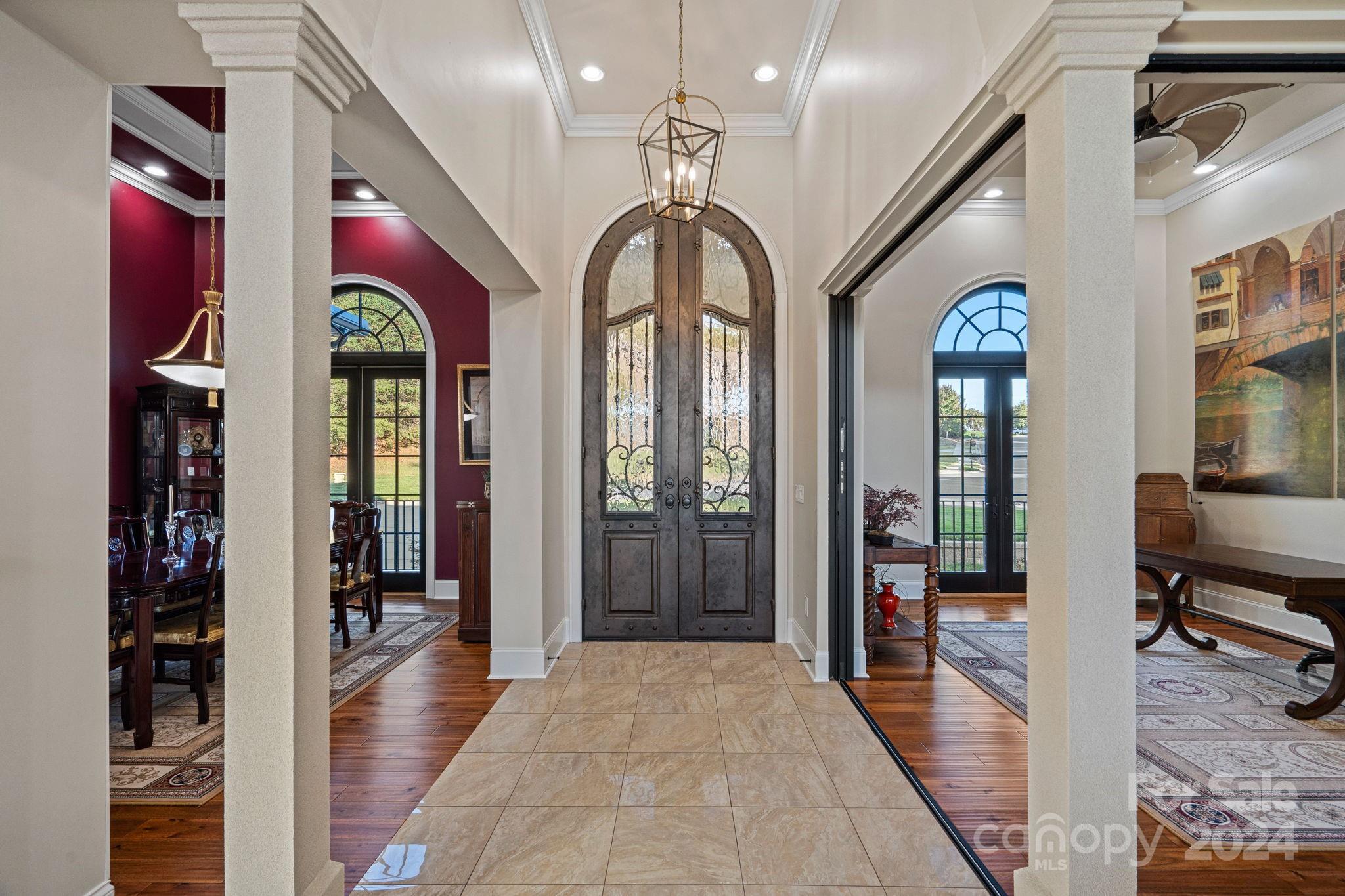 719 Old Cove Road Fort Mill, SC 29708 - Photo 3 of 45 a hall way with furniture and a mirror