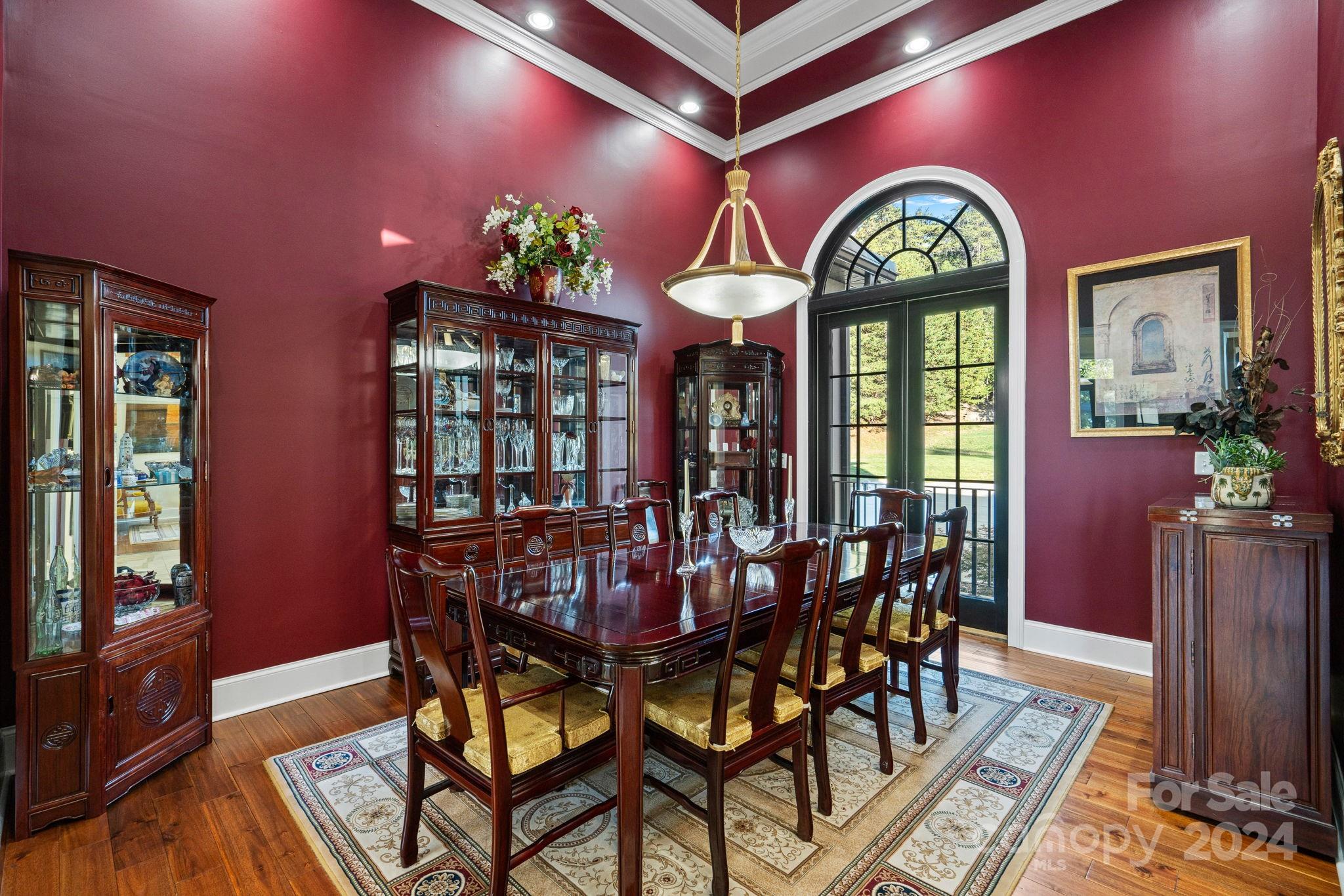 719 Old Cove Road Fort Mill, SC 29708 - Photo 4 of 45 a view of a dining room with furniture and a chandelier