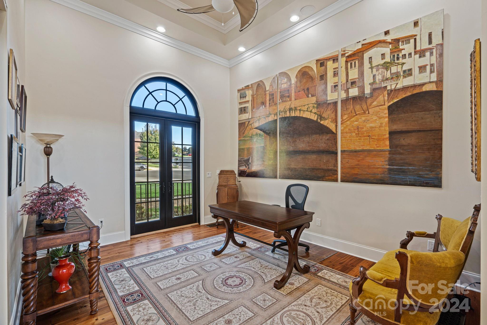 719 Old Cove Road Fort Mill, SC 29708 - Photo 5 of 45 a living room with furniture and a floor to ceiling window