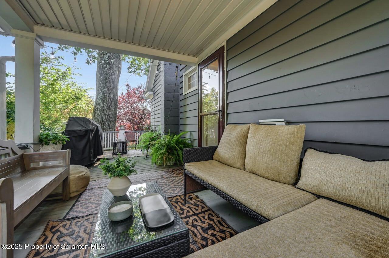 109 Upper Knapp Road, Unit L34 Clarks Summit, PA 18411 - Photo 16 of 39 a balcony with furniture and a potted plant