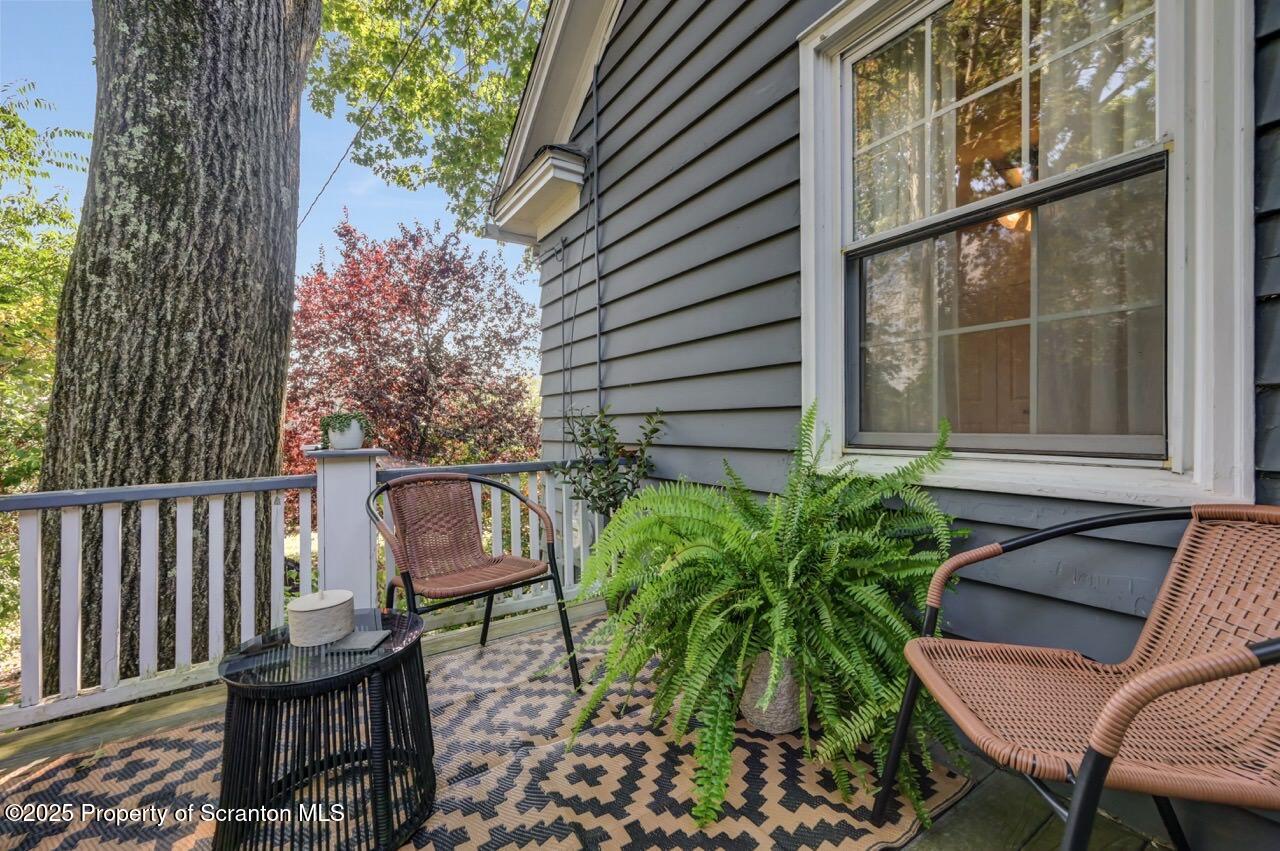 109 Upper Knapp Road, Unit L34 Clarks Summit, PA 18411 - Photo 18 of 39 a view of a two chairs in the patio