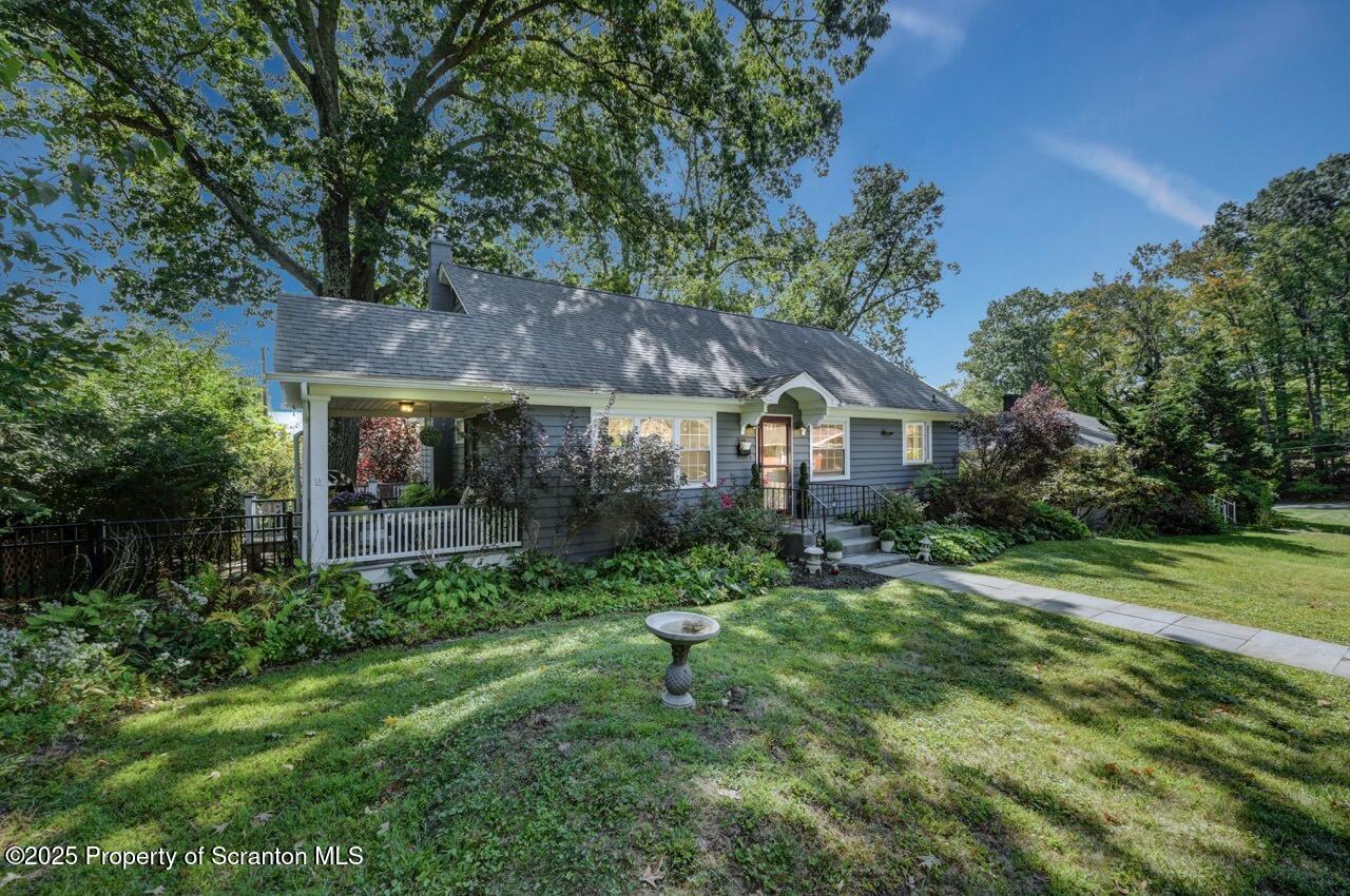 109 Upper Knapp Road, Unit L34 Clarks Summit, PA 18411 - Photo 2 of 39 a house view with a garden space