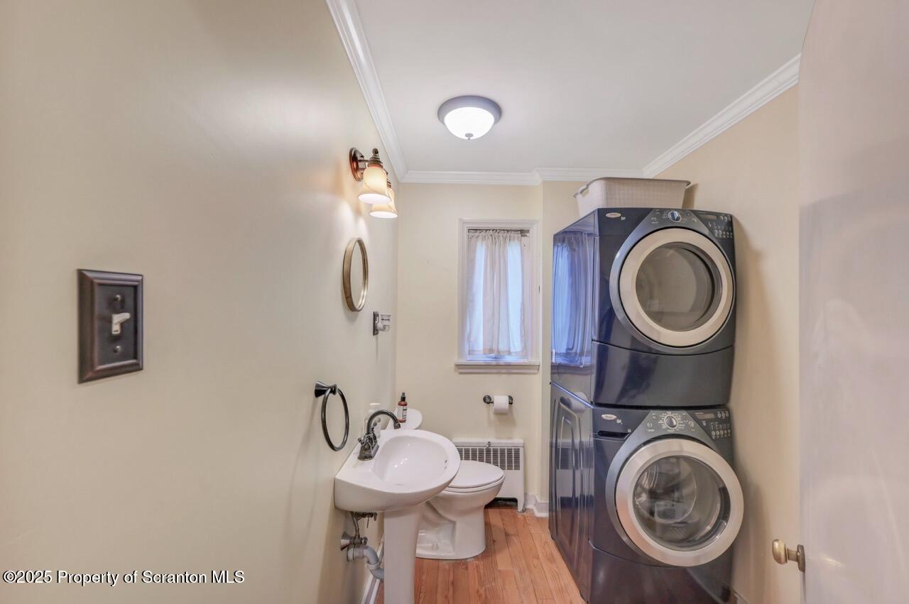 109 Upper Knapp Road, Unit L34 Clarks Summit, PA 18411 - Photo 28 of 39 a bathroom with a sink mirror and toilet