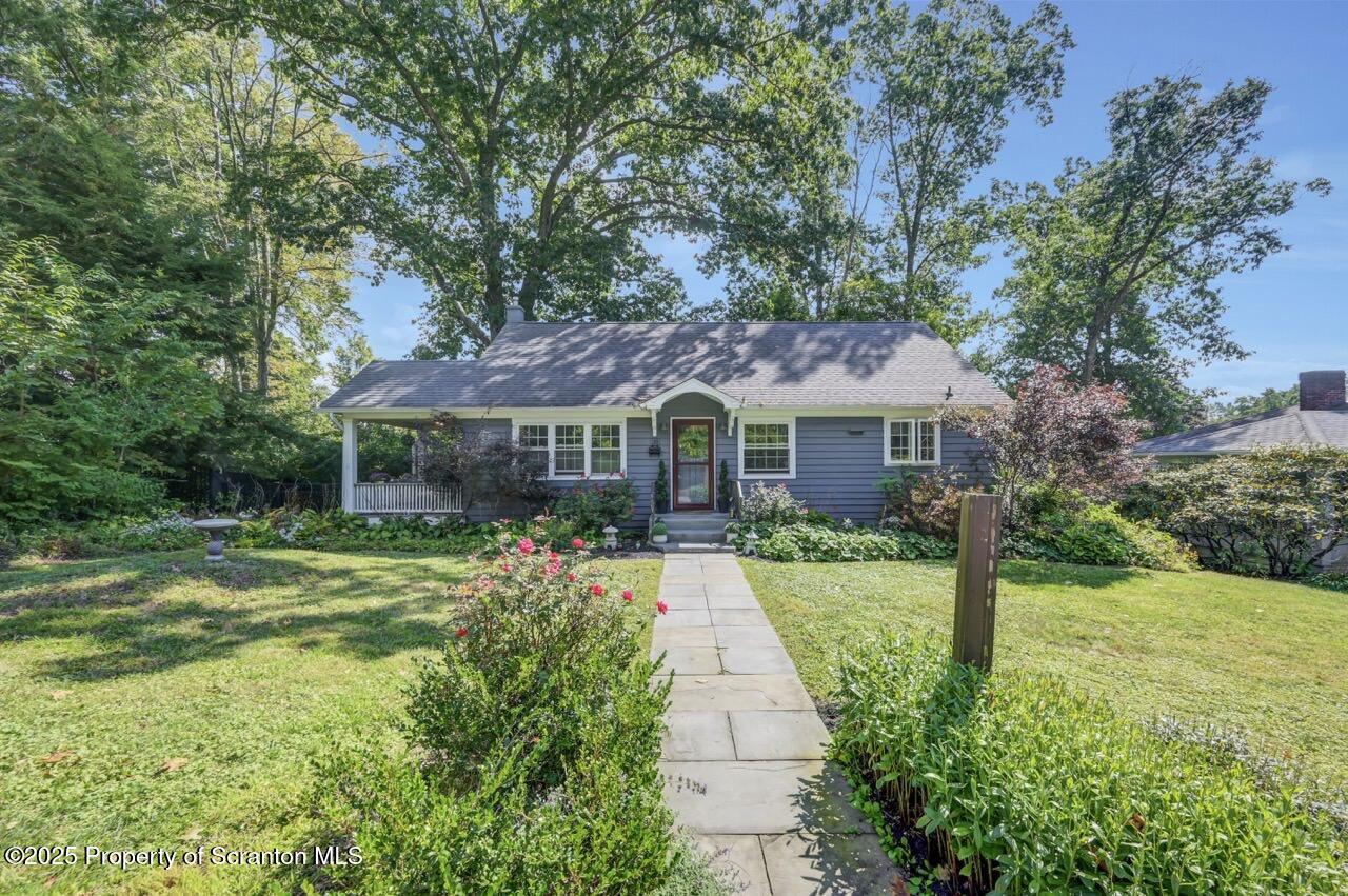 109 Upper Knapp Road, Unit L34 Clarks Summit, PA 18411 - Photo 3 of 39 a front view of a house with a yard
