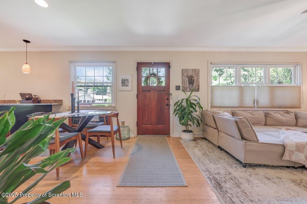 109 Upper Knapp Road, Unit L34 Clarks Summit, PA 18411 - Photo 5 of 39 a living room with furniture and a large window