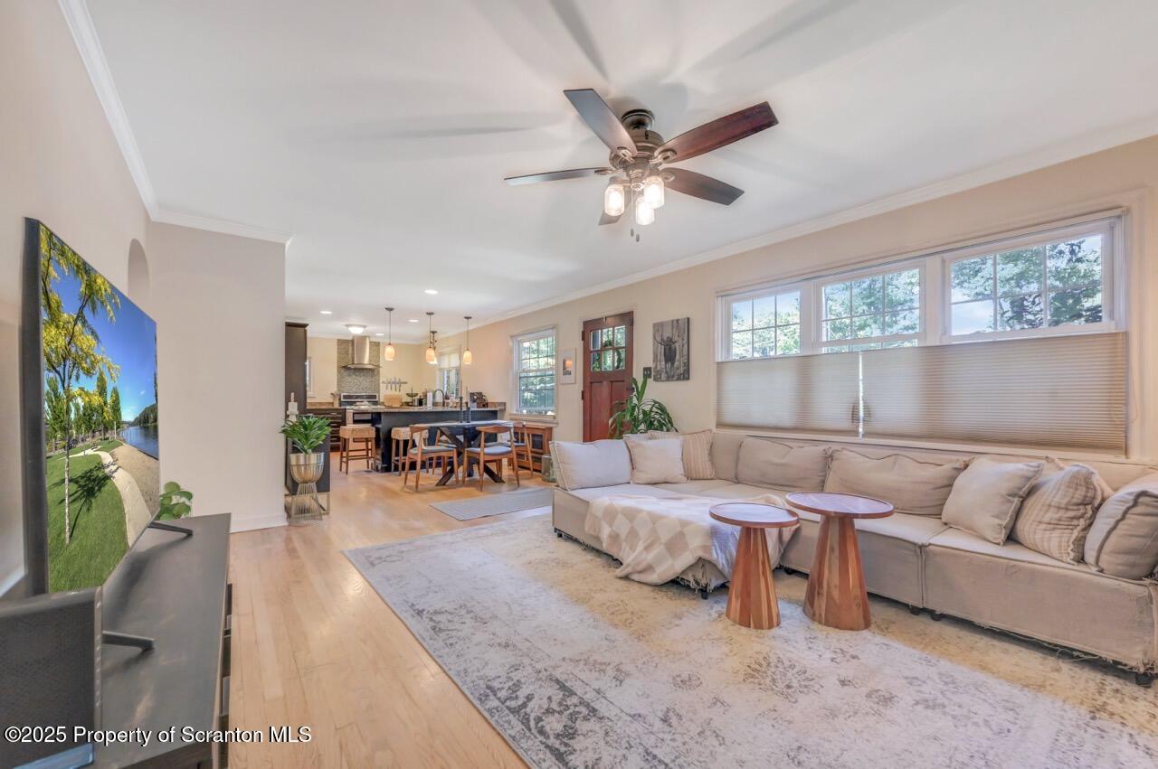 109 Upper Knapp Road, Unit L34 Clarks Summit, PA 18411 - Photo 8 of 39 a living room with furniture and a flat screen tv