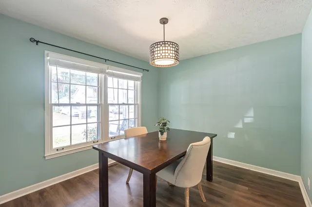 a view of a dining room with furniture