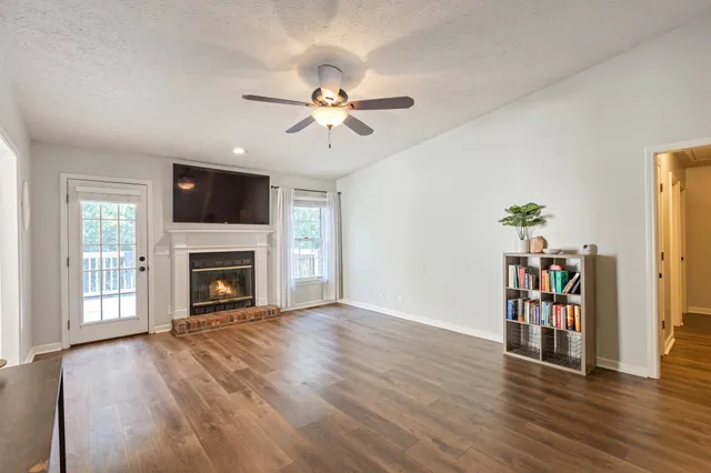 a living room with a fireplace