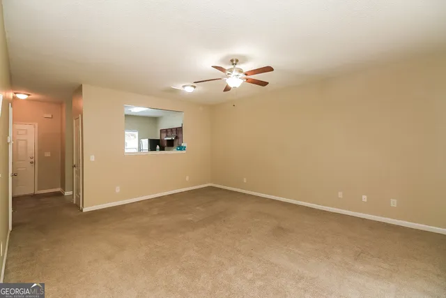 an empty room with a bathroom