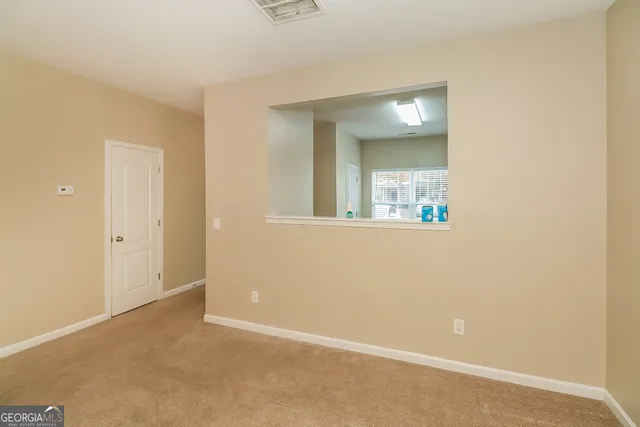 an empty room with window