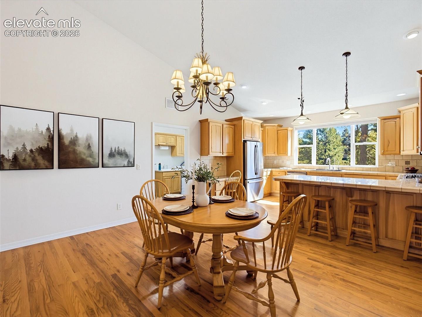 18065 Cumbres Road Peyton, CO 80831 - Photo 13 of 48 Large dining area adjacent to kitchen