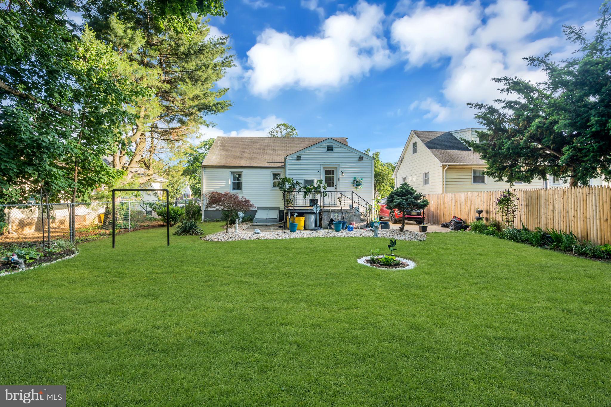 80 Locust Avenue Hamilton, NJ 08620 - Photo 21 of 24 a front view of house with yard and outdoor seating