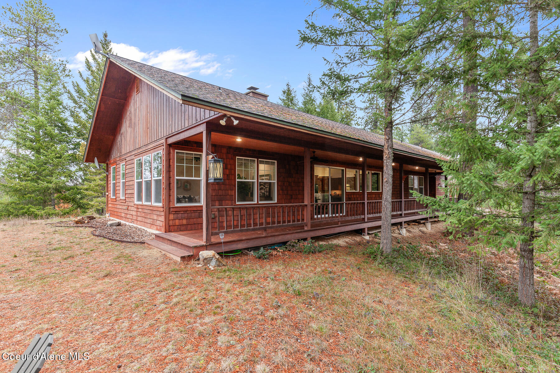 672 Hopkins Road Sandpoint, ID 83864 - Photo 16 of 67 Wrapped and Covered Porch