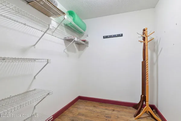 a view of a room with rack on the wall