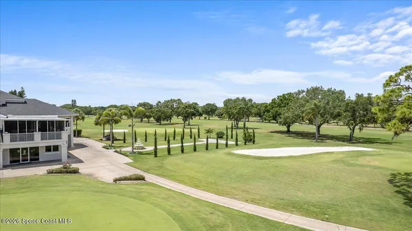 a view of a lake with a garden