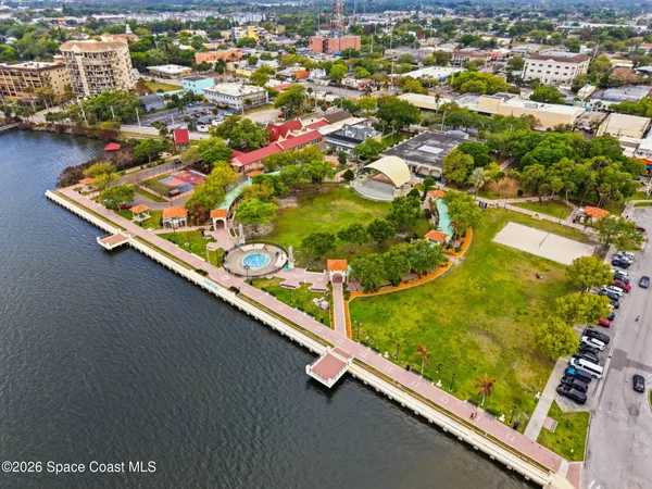 a view of a lake with houses with outdoor space