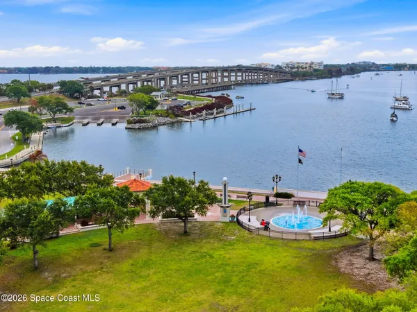 a terrace with outdoor seating and city view