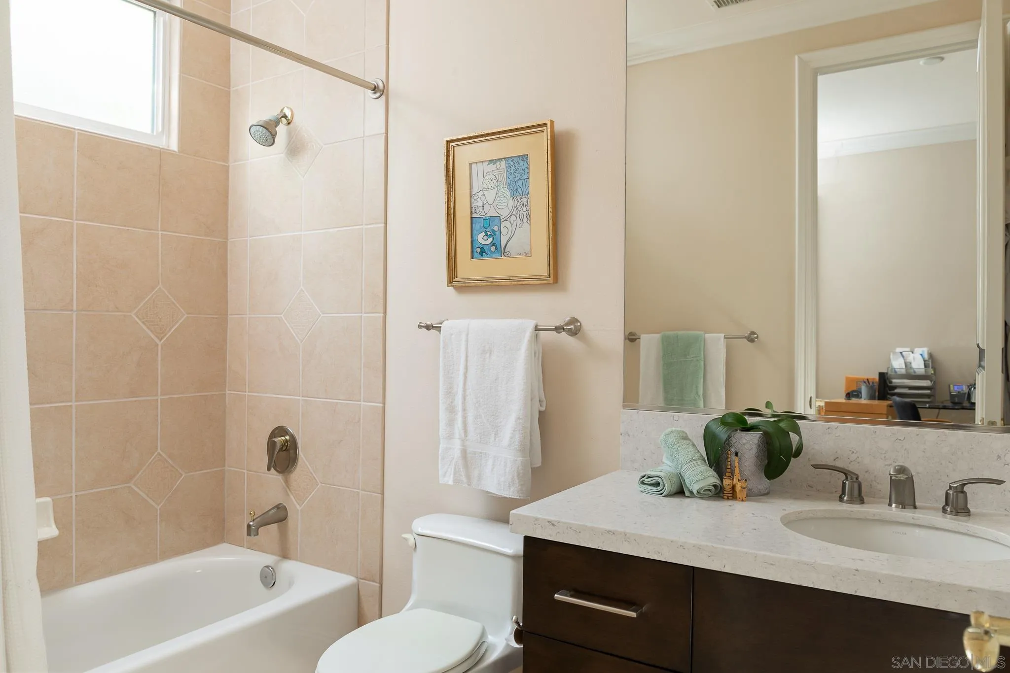 16319 Martincoit Road Poway, CA 92064 - Photo 12 of 29 a bathroom with a granite countertop sink a toilet and shower