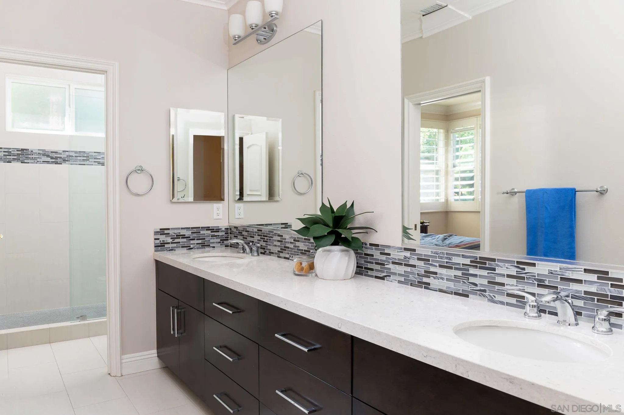 16319 Martincoit Road Poway, CA 92064 - Photo 19 of 29 a bathroom with a sink and a mirror