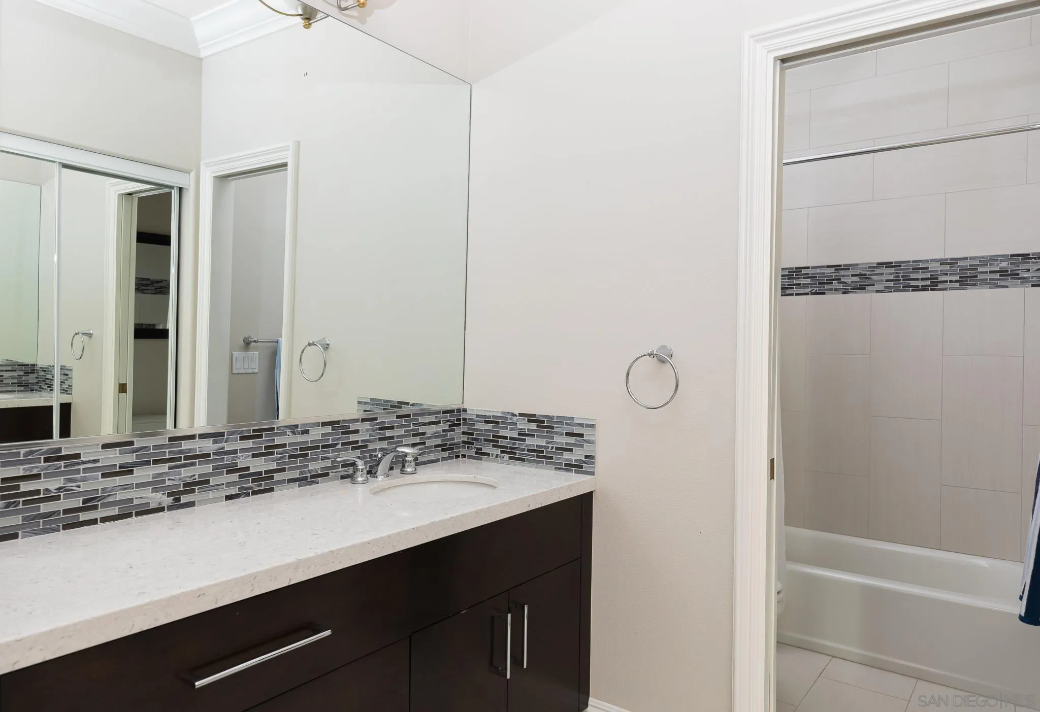 16319 Martincoit Road Poway, CA 92064 - Photo 20 of 29 a bathroom with a sink and a mirror