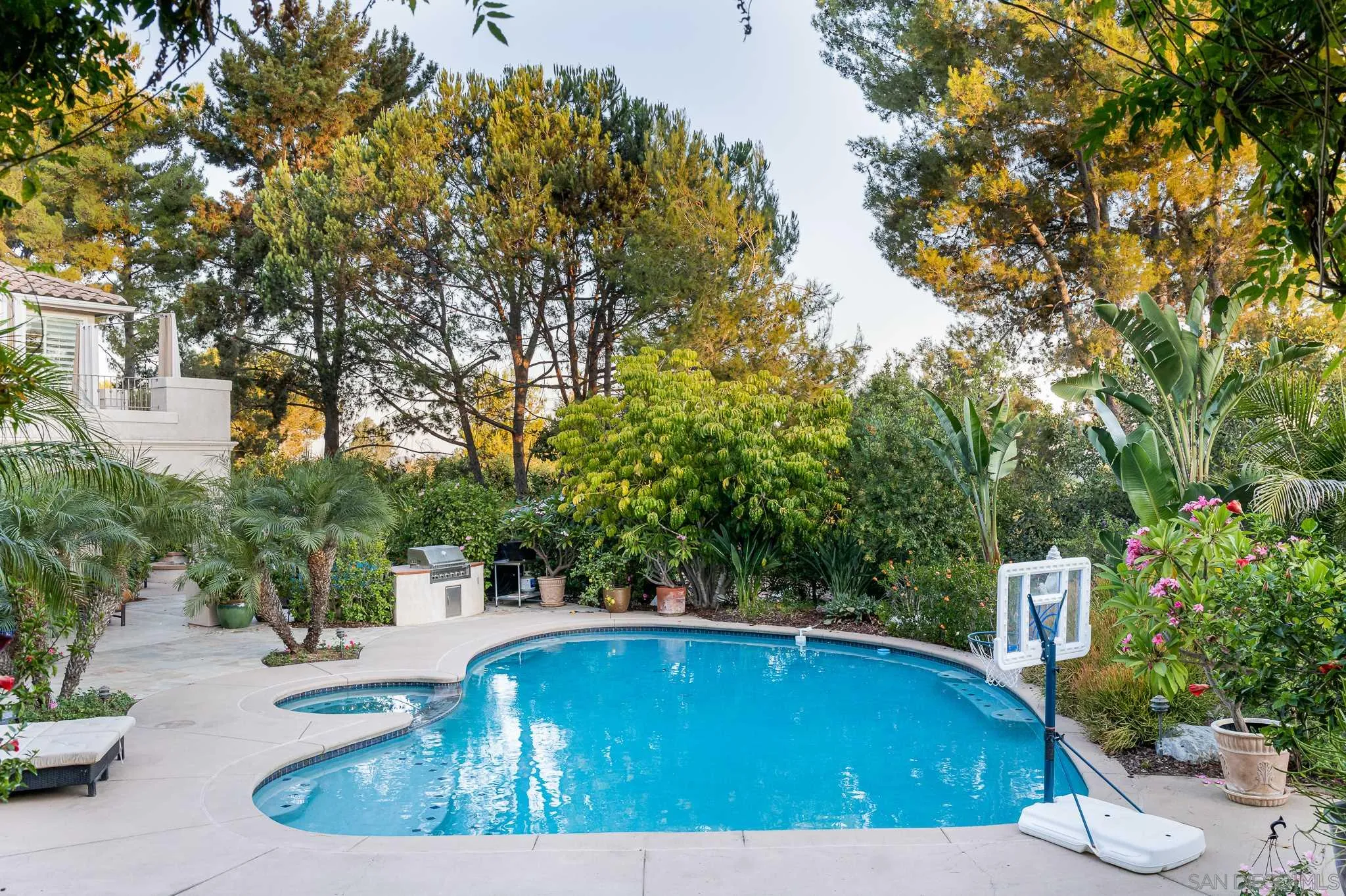 16319 Martincoit Road Poway, CA 92064 - Photo 28 of 29 a view of a swimming pool with a patio