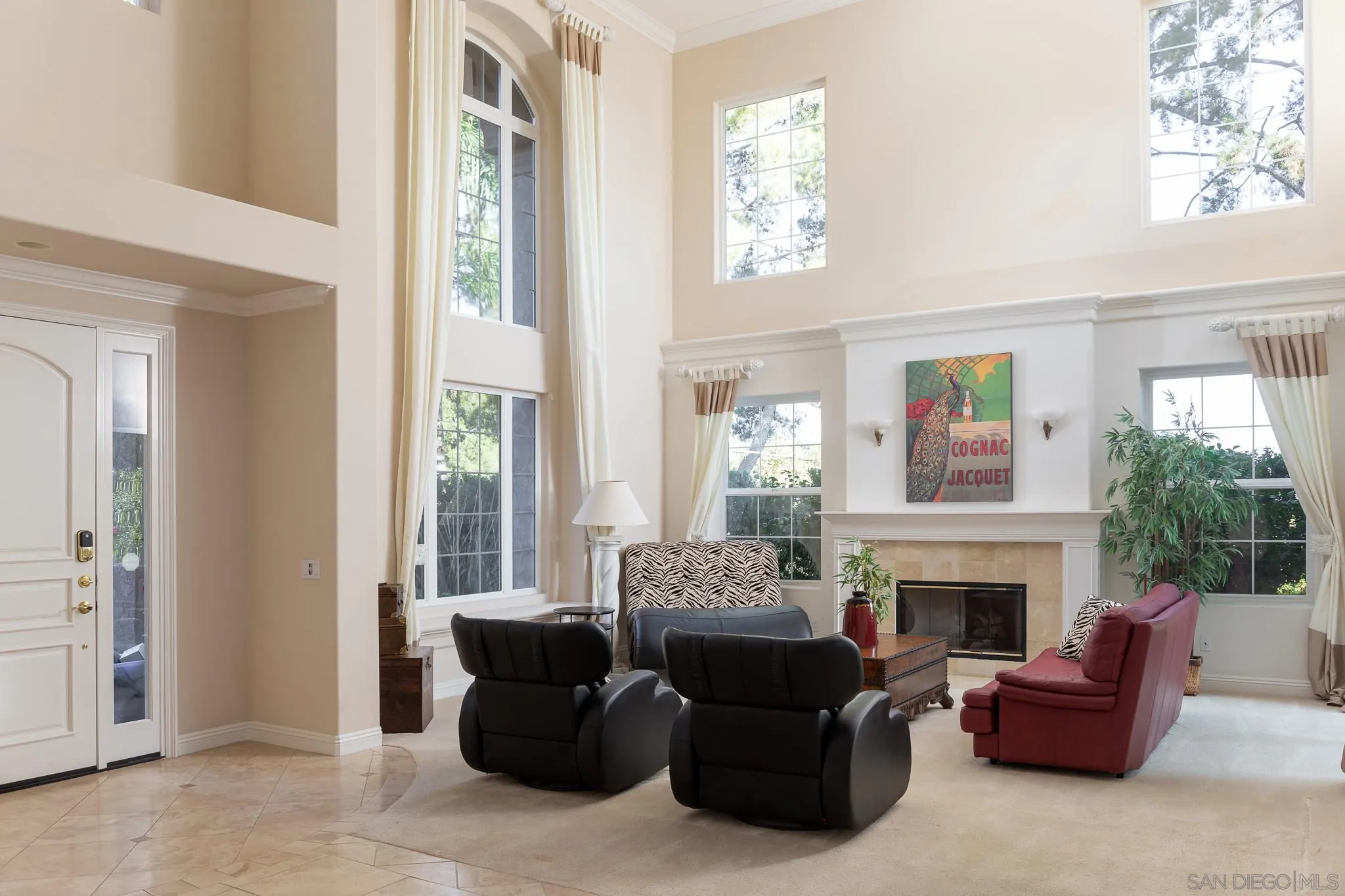16319 Martincoit Road Poway, CA 92064 - Photo 3 of 29 a living room with furniture and a fireplace